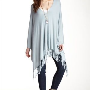 NWT Love stitch cream fringe poncho. One size